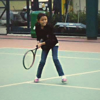 Pearl as a young girl in a ready stance