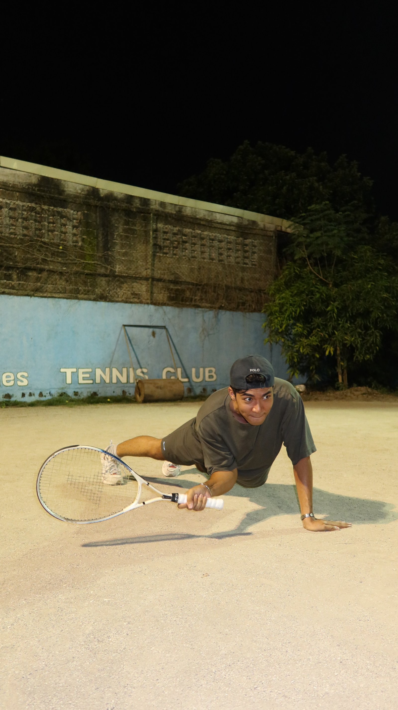 Playful dive for the ball, night session
